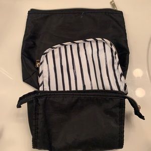Three cosmetic bags